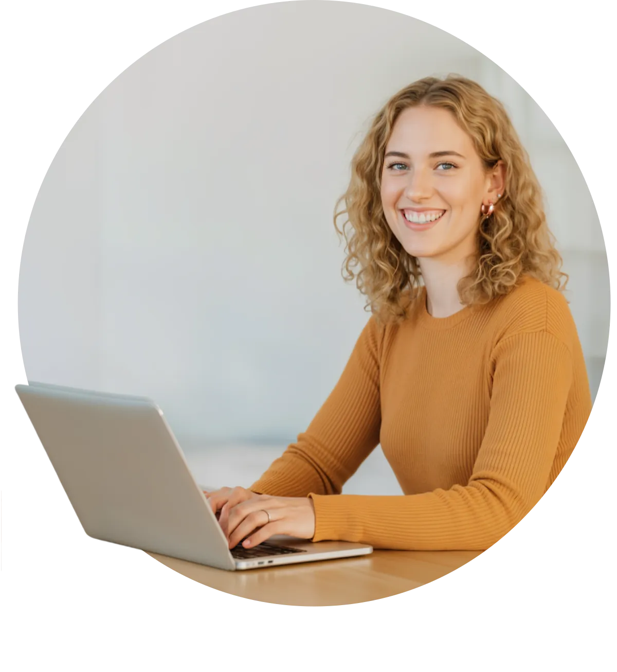 Person using a laptop to work with Naudigi